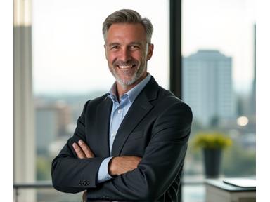 Michael R., a well-dressed executive, smiling confidently in a modern home office setting, representing professional success through improved sleep.