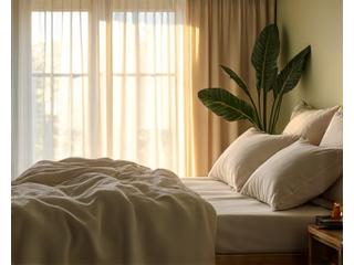 Serene bedroom with soft lighting, emphasizing restorative sleep
